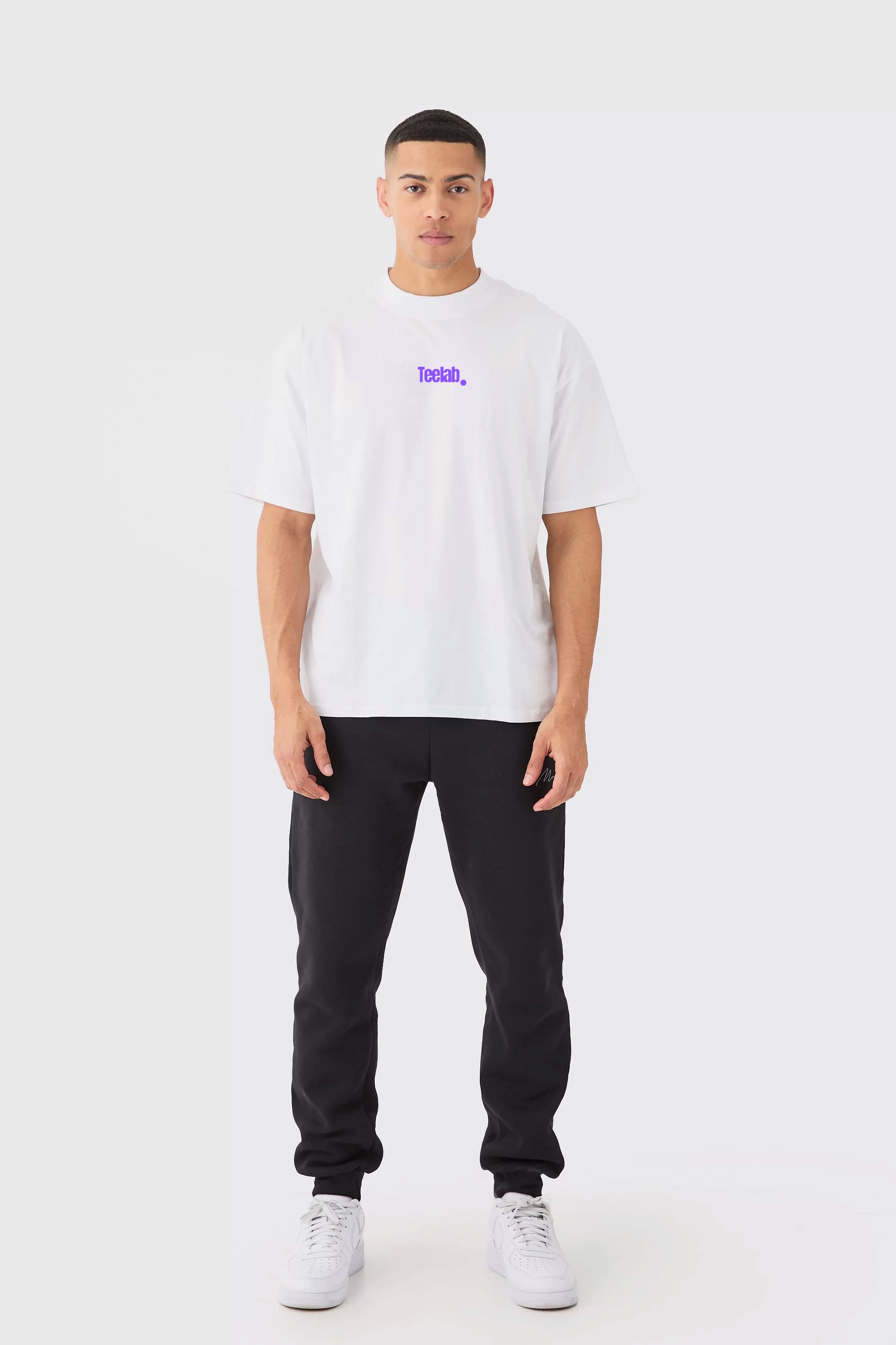 We Lift. They Watch. Tee – Statement Fit (70% Cotton, 30% Polyester)