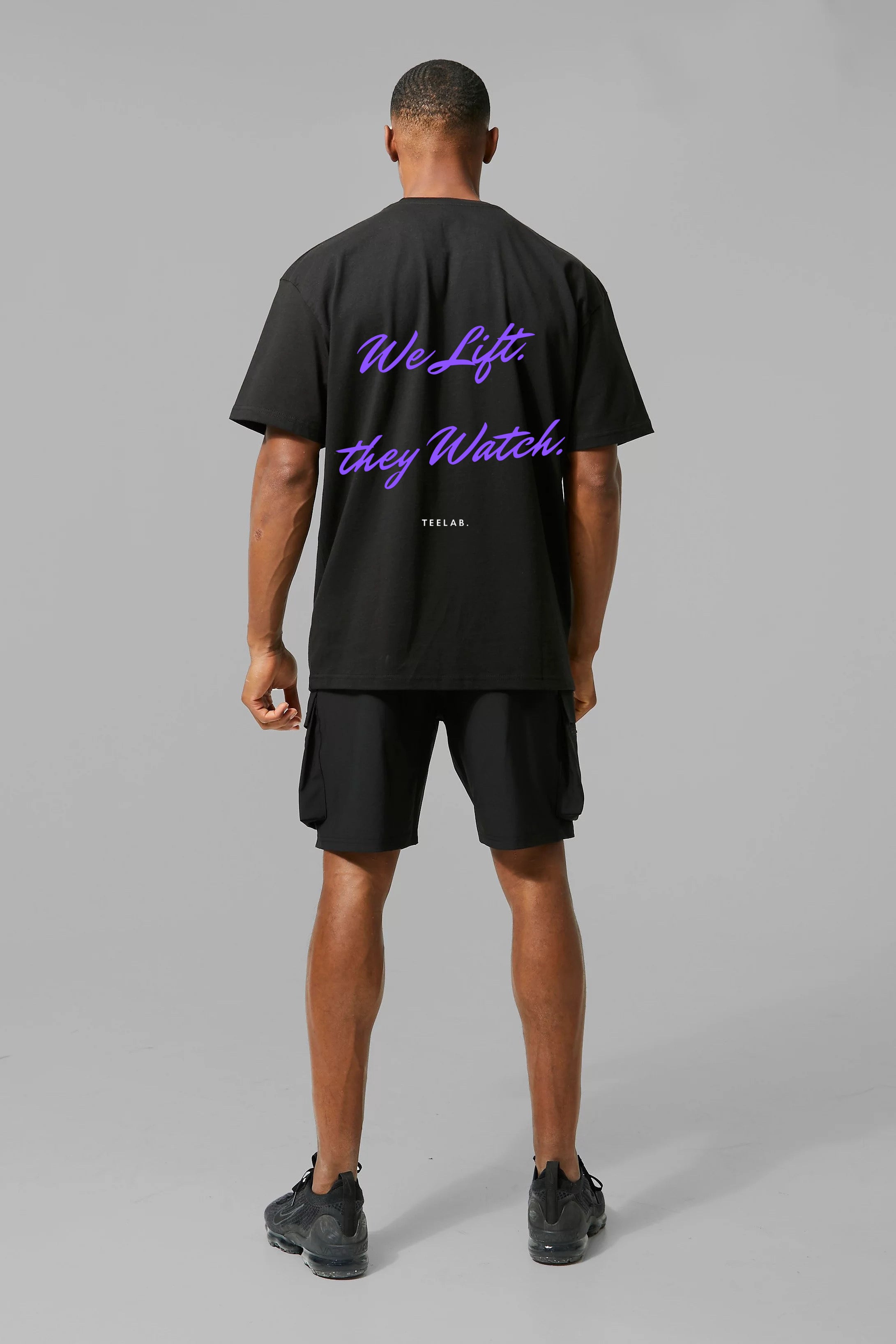 We Lift. They Watch. Tee – Statement Fit (70% Cotton, 30% Polyester)